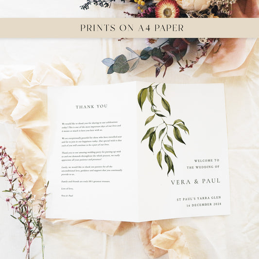 Folded A4 wedding ceremony booklet template showing the thank-you message and front cover side by side. A minimalist green foliage design for modern couples, photographed with eucalyptus leaves and soft neutral tones.