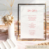 Framed bar menu template with decorative floral elements in a light table setting.