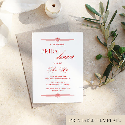 Red old-money style bridal shower invitation template on a textured surface with olive branches.