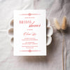 Red bridal shower invitation template on a textured surface with dried flowers.