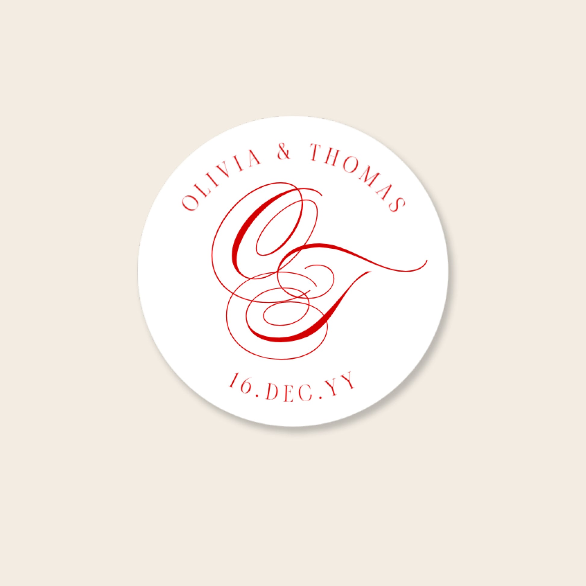 Round white invitation seal with red monogram text on a beige background.