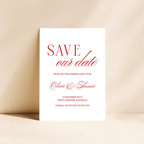 Heritage save the date card standing upright on a neutral background.