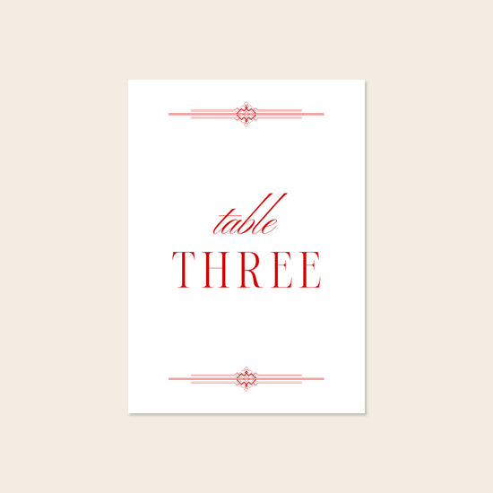 Wedding printable table number template design on a beige background.