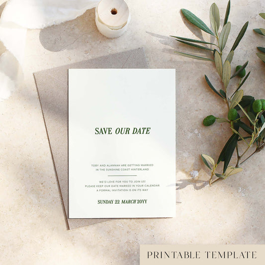 Minimal save the date card with olive branch on a textured surface.