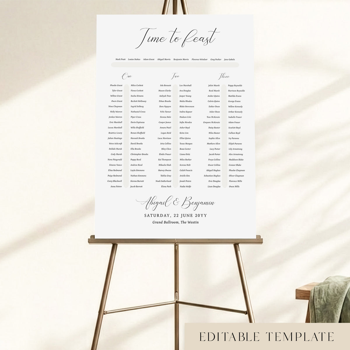 Classic three long tables wedding seating chart template with an elegant 'Time to Feast' calligraphy heading, displayed on a bronze easel, editable in Canva.