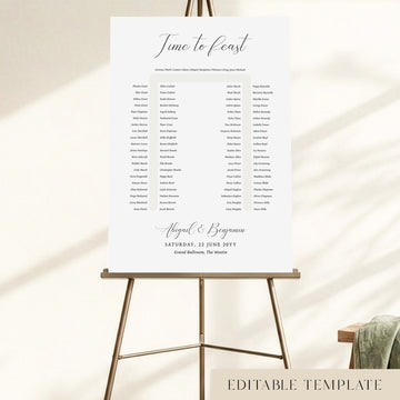 Elegant 90-guest U-shape wedding seating chart template with a 'Time to Feast' calligraphy heading, displayed on a bronze easel, fully editable in Canva.