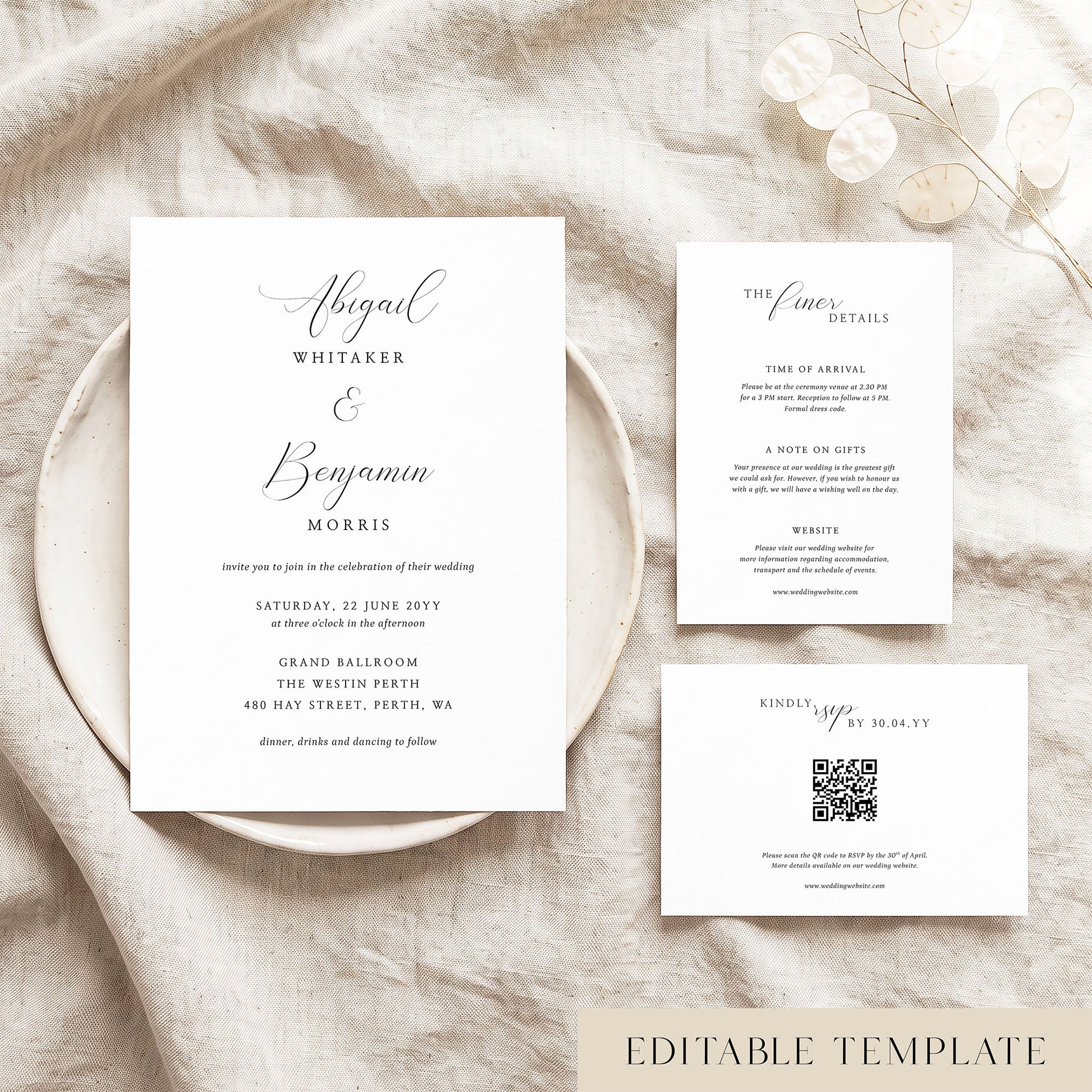 Editable romantic calligraphy wedding invitation suite with details and RSVP cards on a ceramic plate flat lay