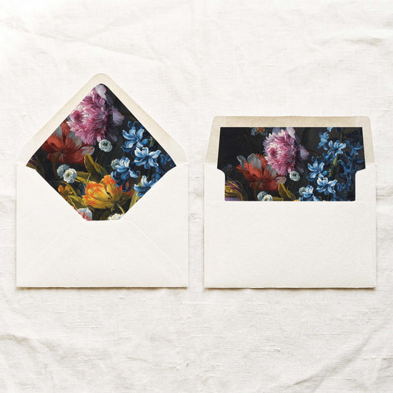 DIY fine art blue hyacinth envelope liners in a euro flap and a straight flap, with a dark floral painting by Jean-Baptiste Monnoyer in cobalt blue, magenta, coral and marigold for 5x7 wedding invitations.