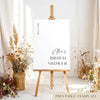 Bridal shower printable welcome sign template with floral decorations and a wooden easel.