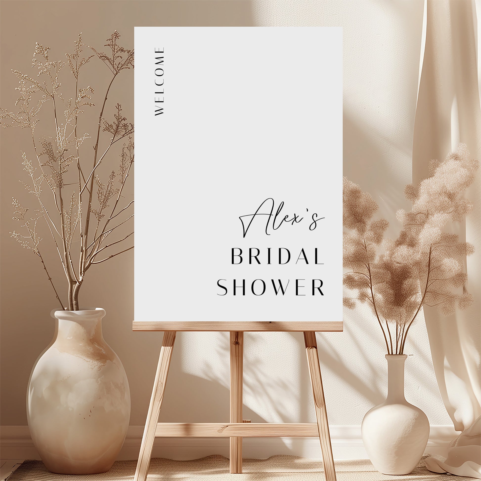 White printable bridal shower welcome sign template with floral decorations and a wooden easel.