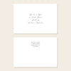 Two white invitation envelopes with address text on a beige background.