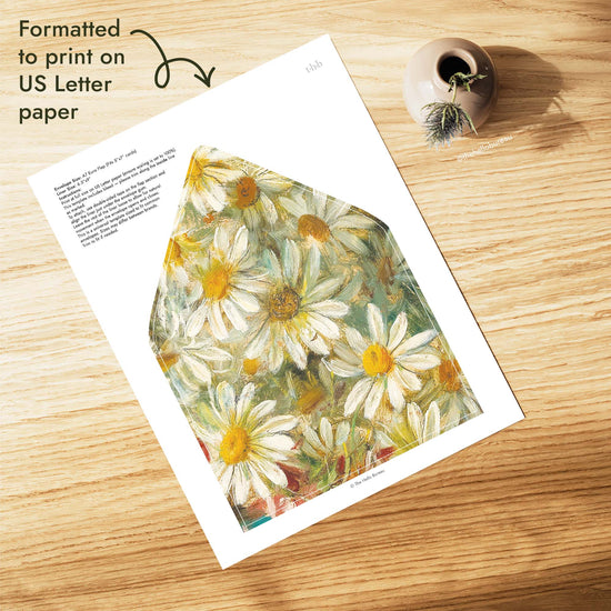 Printable vintage daisies envelope liner formatted for US Letter paper, sized for an A7 euro flap envelope that fits 5x7 wedding invitations, with thick brushwork in cream and gold, DIY and ready to print at home.