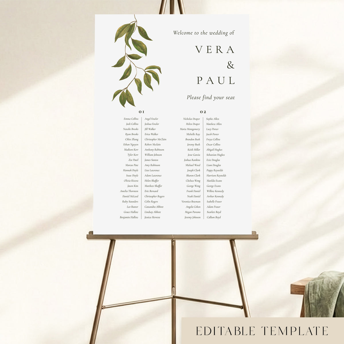 A 2-long-table wedding seating chart displayed on an easel, with hand-painted greenery and guest names