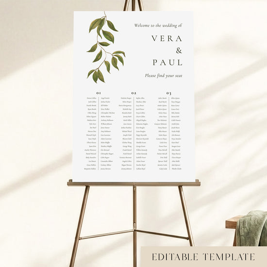Editable 3-long-table wedding seating chart on an easel, with hand-painted botanical foliage and guest names organised across three columns
