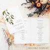 Flat-lay of a printable greenery wedding ceremony booklet template. The editable wedding program cover reads “Welcome to the Wedding of Vera & Paul”, styled with dried flowers and soft fabric on a cream backdrop.