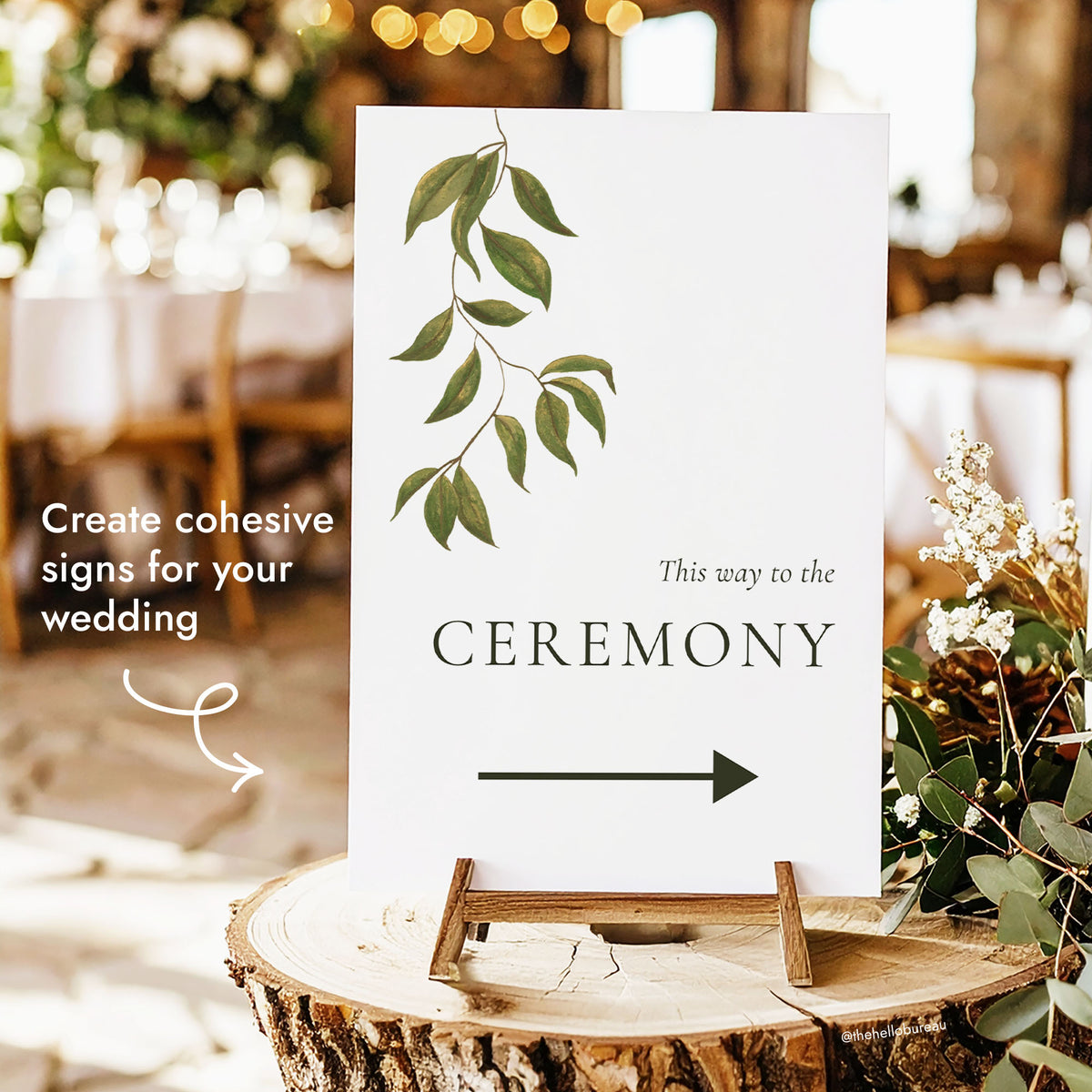 Green and white “This way to the Ceremony” wedding sign with a hand-painted botanical leaf branch and arrow, on a wooden easel. Editable Evergreen ceremony sign template for DIY Canva weddings.