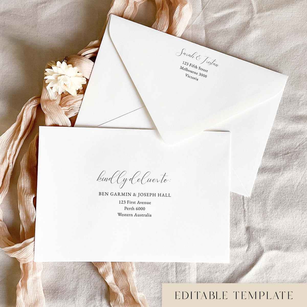 Elegant editable wedding envelope address template in Canva, with black text on a white envelope. The “kindly deliver to” script sits above the guest address, and the back flap shows a return address, styled with blush pink ribbon and a cream dried flower.