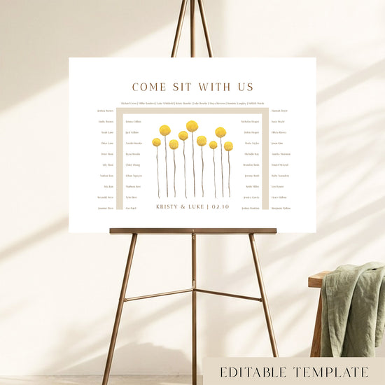 46-guest U-shape wedding seating chart template with hand-painted yellow billy button wildflowers, displayed on a bronze easel, fully editable in Canva.