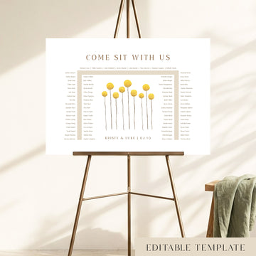 78-guest U-shape wedding seating chart template with hand-painted yellow billy button wildflowers, displayed on a bronze easel, fully editable in Canva.