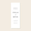 Vertical white fabric sign template on a beige background.