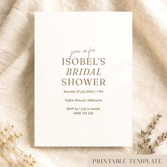 Minimal bridal shower invitation template on textured card on fabric background.