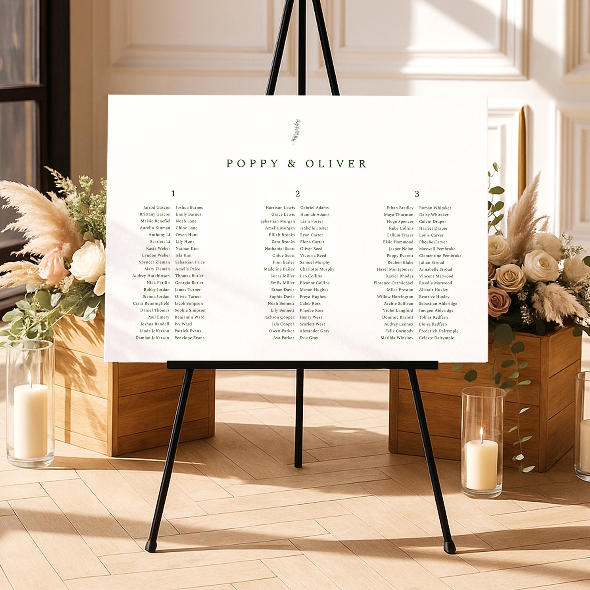 Modern seating chart template on an easel with floral arrangements and candles in a decorative setting.