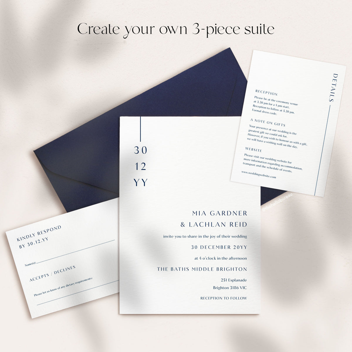 Three-piece minimalist wedding invitation suite with 5x7 invitation, details card and RSVP card on a navy envelope