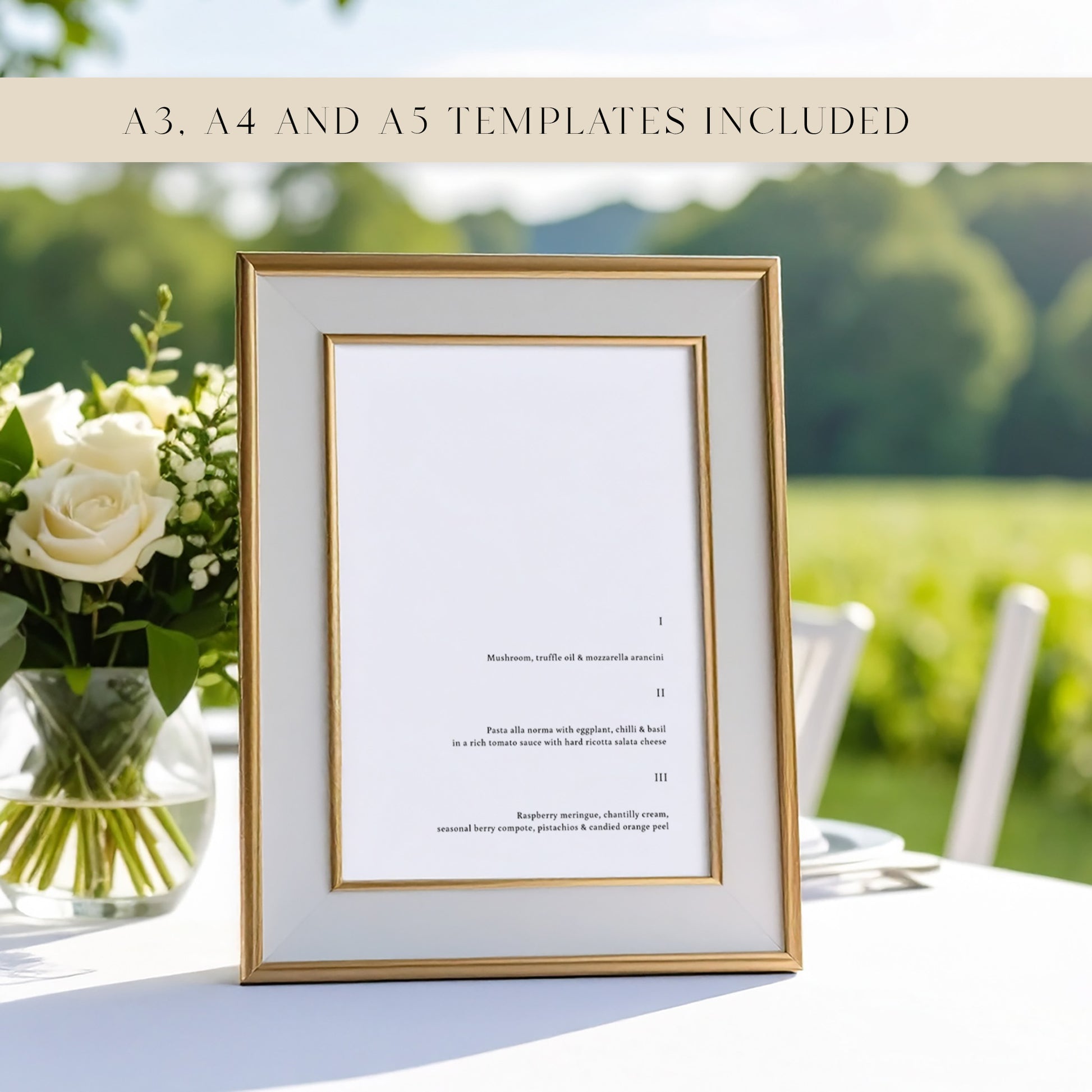 Framed wedding menu with floral arrangement on a table at an outdoors wedding.