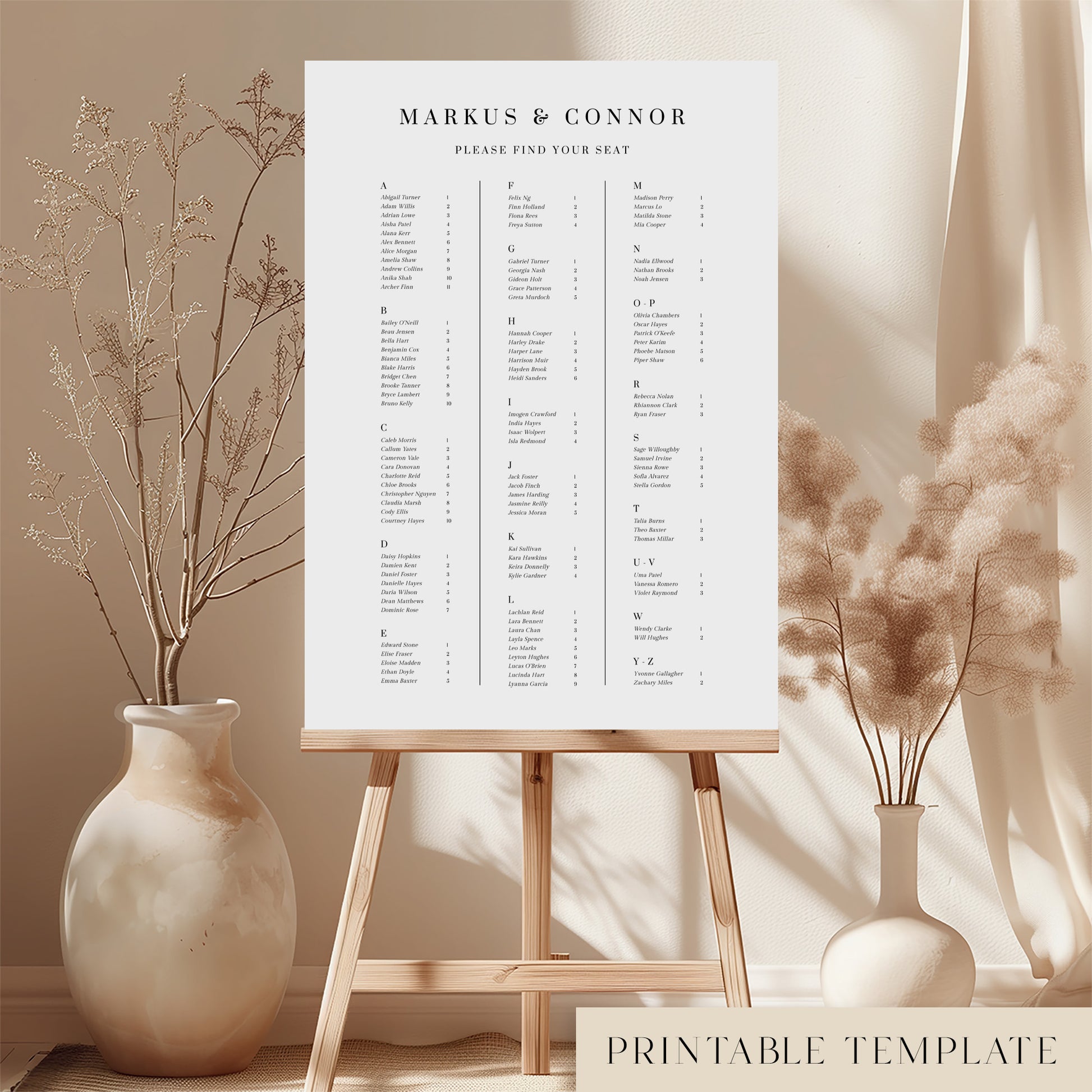 Printable alphabetical wedding seating chart sign on an easel with floral arrangements in a room setting.