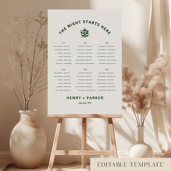 Six long tables wedding seating chart template on an easel with decorative vases and plants.