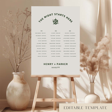 Modern micro wedding seating chart template on an easel with decorative vases and plants.