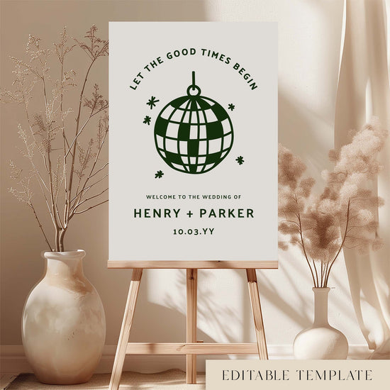 Printable wedding welcome sign template featuring a bold disco ball icon and curved retro typography, styled on an easel with soft floral arrangements in a neutral room setting.