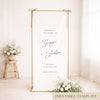 Gold frame with a hanging white linen wedding welcome sign.