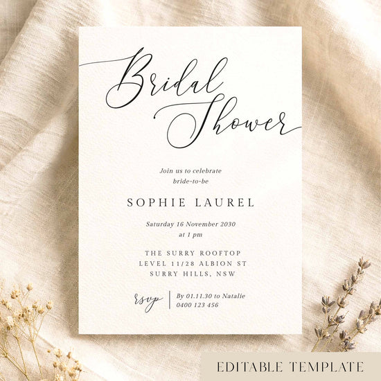 Elegant bridal shower invitation template on textured card on fabric background.