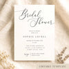 Elegant bridal shower invitation template on textured card on fabric background.