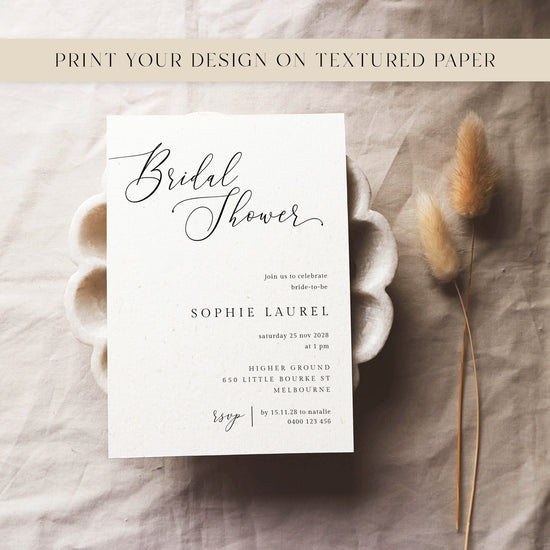 Bridal shower invitation template design on textured paper with dried flowers.