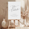 Elegant engagement party welcome sign on an easel with floral arrangements in a room setting.