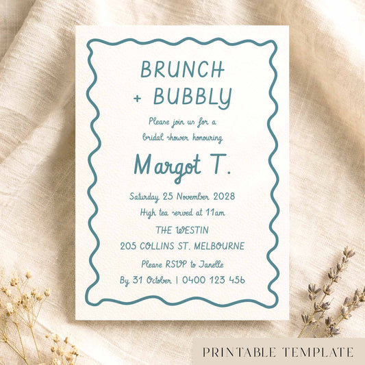 Whimsical hand-drawn bridal shower invitation template on textured card on fabric background.