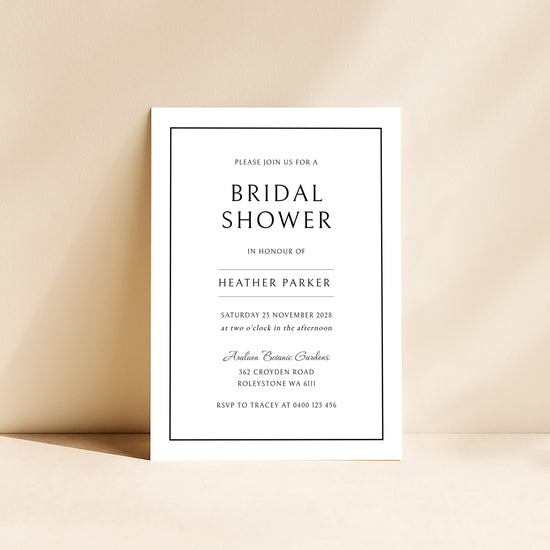 Modern bridal shower invitation card on a beige background.