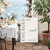 Engagement announcement sign in an outdoor Mediterranean terrace