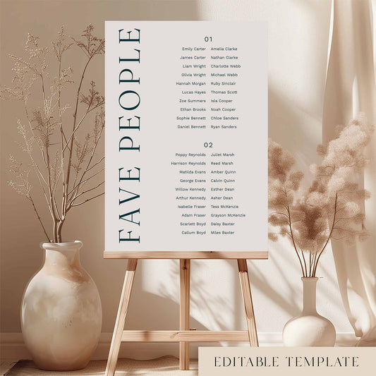 Modern 2-table micro wedding seating chart template on an easel with decorative vases and plants.