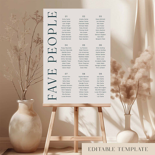 Modern 9-table seating chart template on an easel with decorative vases and plants.