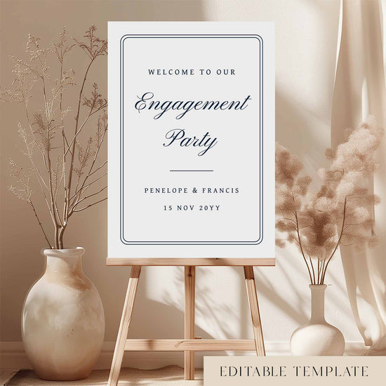 Engagement party welcome sign on an easel with decorative vases and plants.