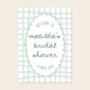 Blue whimsical bridal shower welcome sign template design on a beige background.
