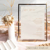 Framed bar menu template with decorative floral elements in a light table setting.