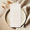 Printable wedding menu template displayed on a ceramic plate with neutral linen and dried flowers in a minimal, natural setting.