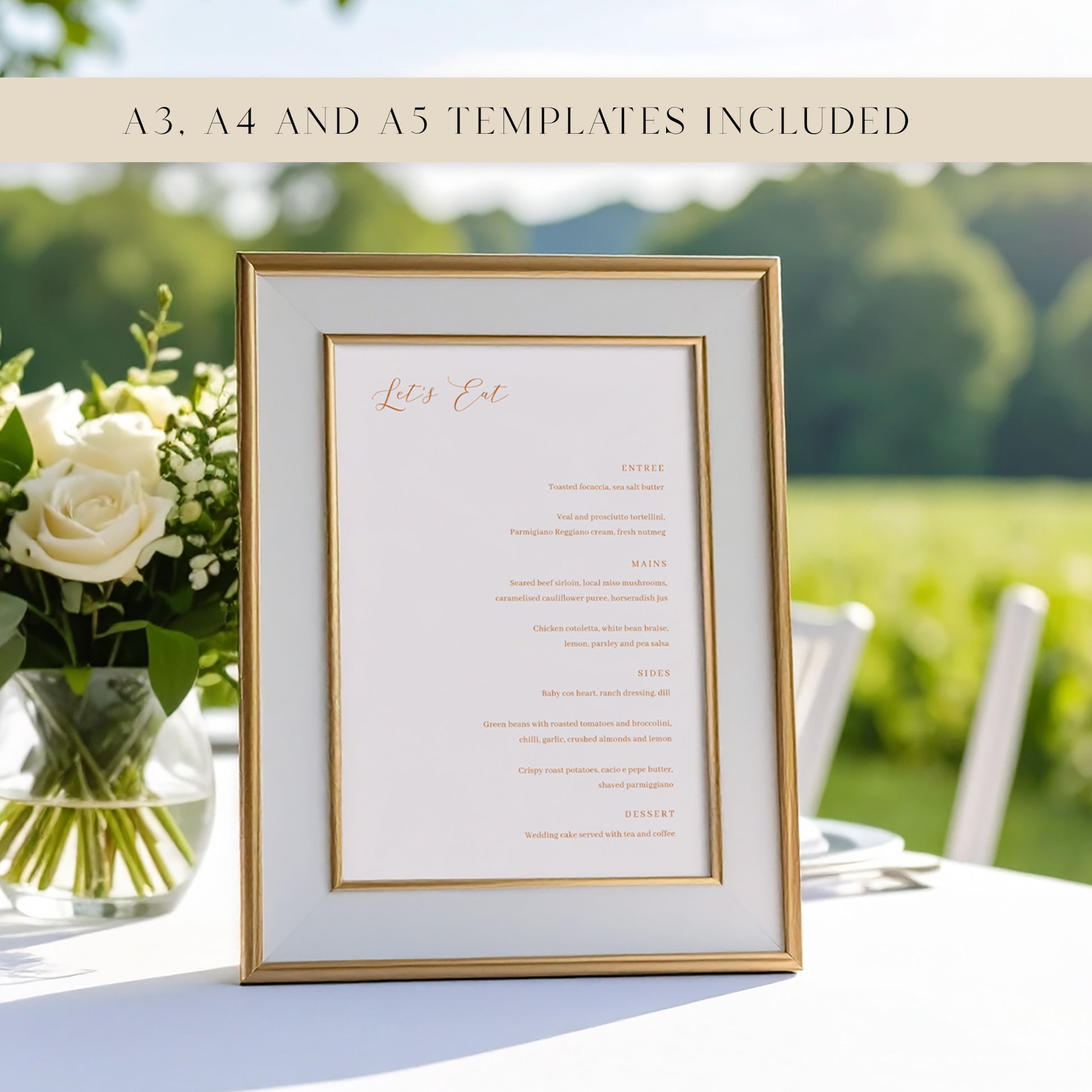 Framed wedding menu with floral arrangement on a table at an outdoors wedding.