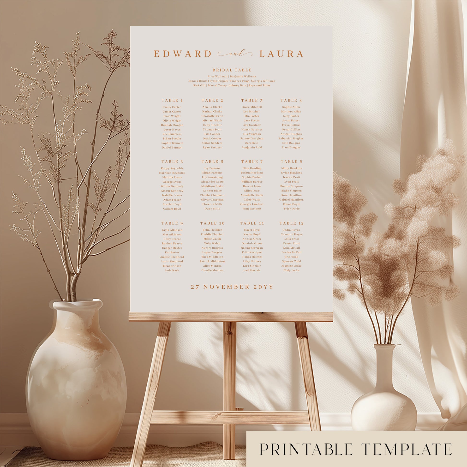 Printable minimal wedding seating chart sign on an easel with floral arrangements in a room setting.