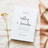 A5 wedding church ceremony booklet cover, photographed on light fabric with minimal floral styling.