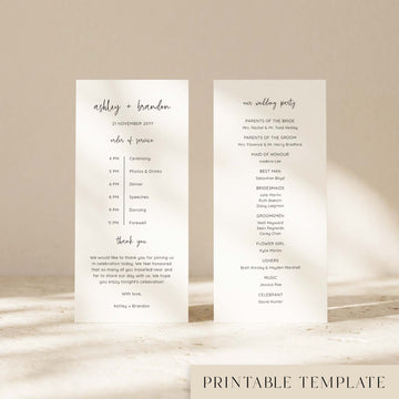 Two DL-sized wedding program cards standing upright on a textured surface with soft natural light creating shadows across the background.